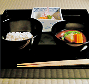 a tray with Japanese food
